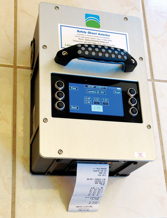 Safety Direct America Bot-3000 universal walkway tester digital tribometer with printed data.